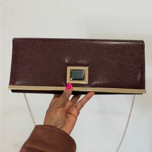 Elegant Brown Clutch with Gold Accents